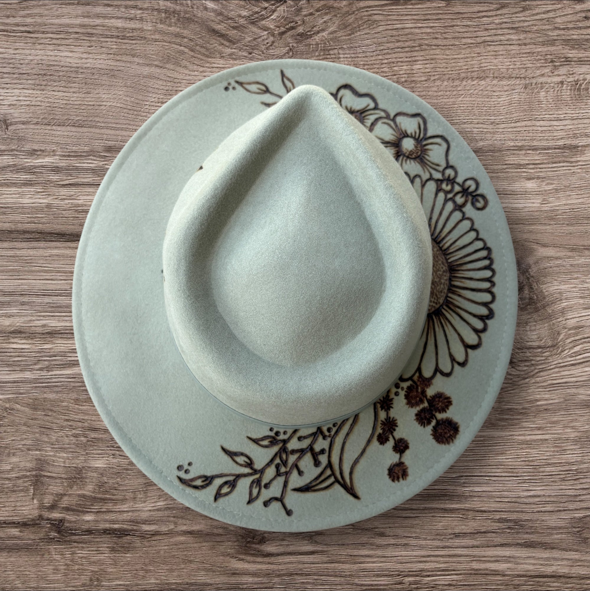 Mint Fedora - 100% wool. With pyrography flowers and  ‘Every flower blooms on its own time’ quote on underside of brim.