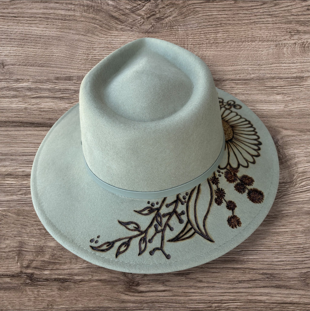 Mint Fedora - 100% wool. With pyrography flowers and  ‘Every flower blooms on its own time’ quote on underside of brim.
