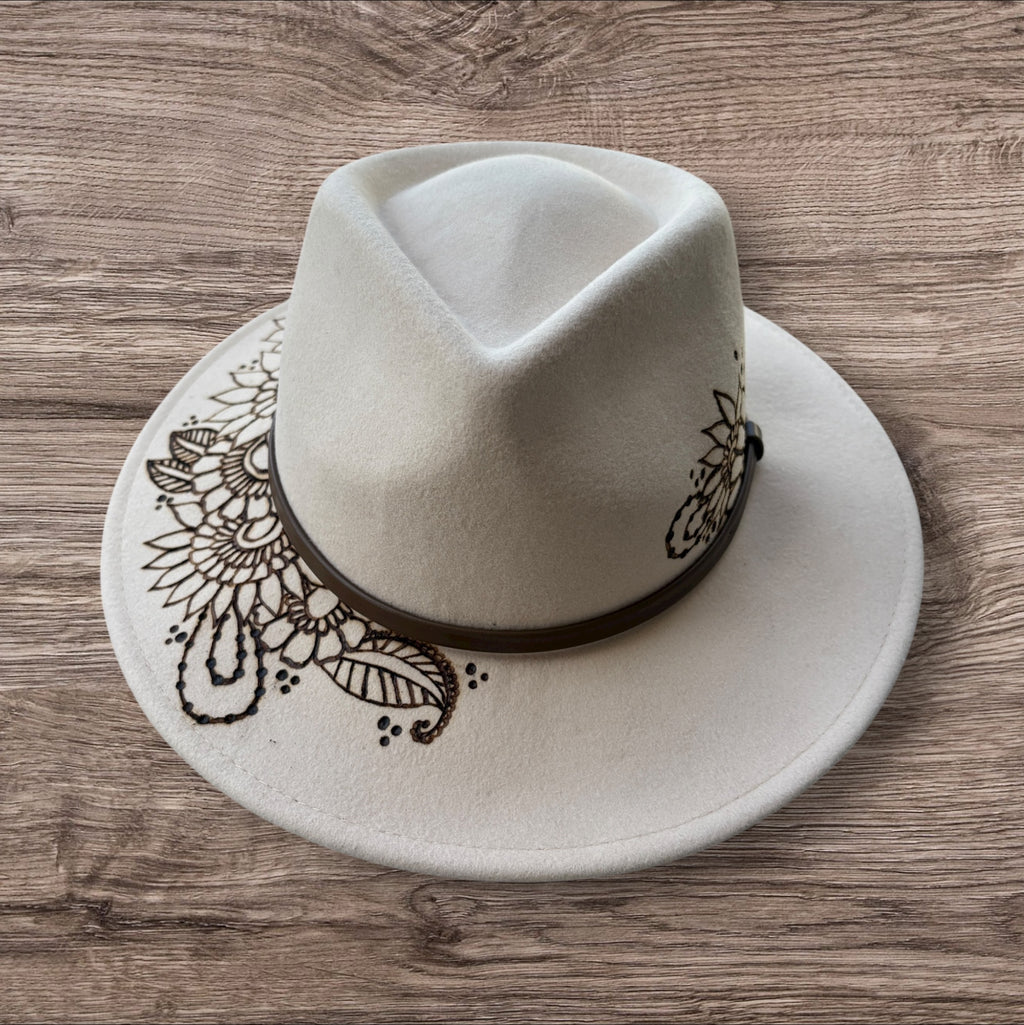 Oatmeal Fedora- 100% wool. Burnt Mandela with ‘be you, the world will adjust’ quote underneath brim.