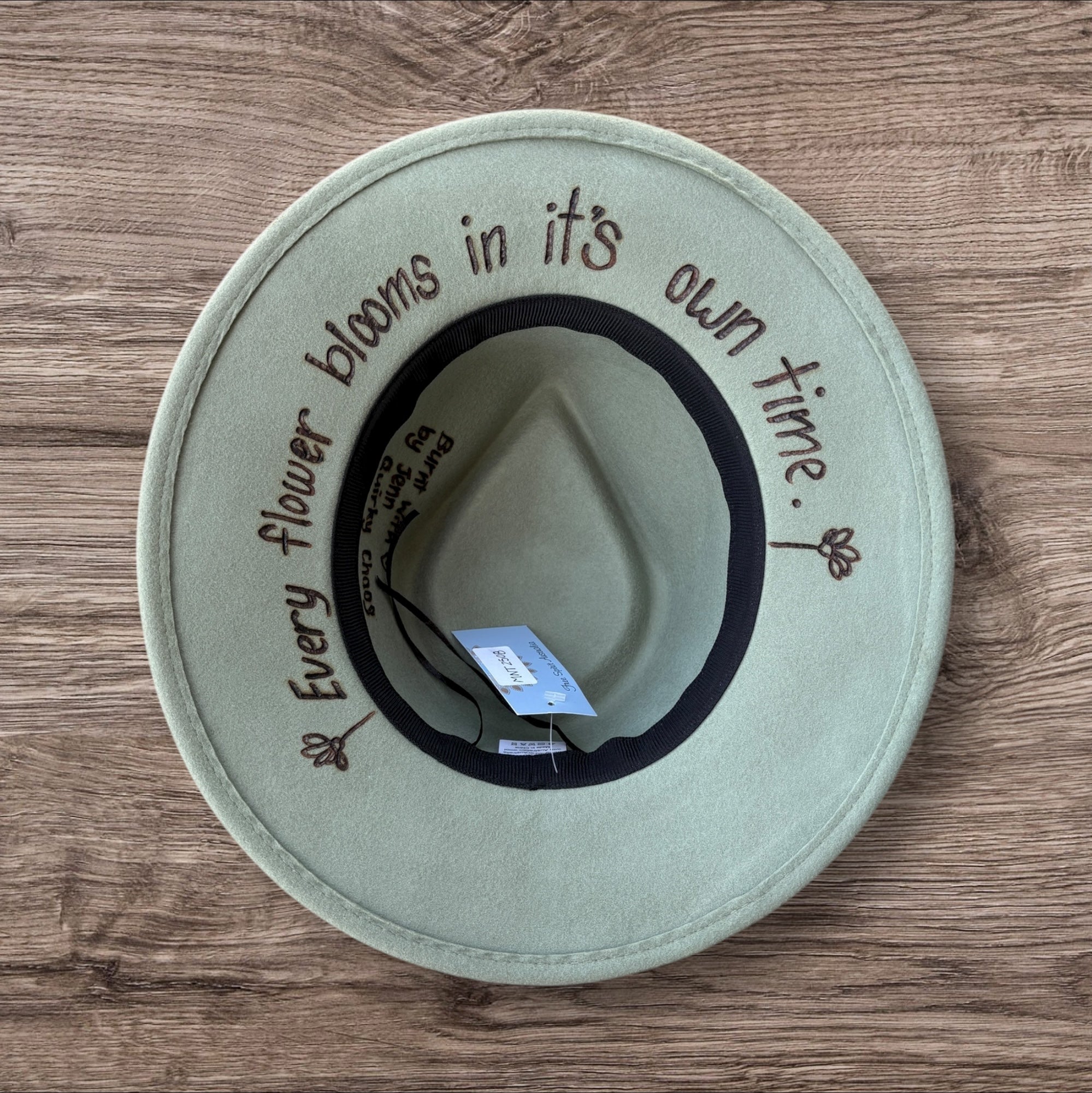 Mint Fedora - 100% wool. With pyrography flowers and  ‘Every flower blooms on its own time’ quote on underside of brim.