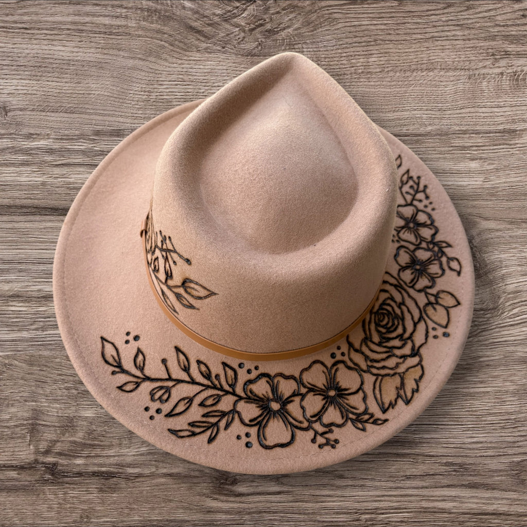 Camel Fedora- 100% wool. Pyrography flowers with ‘nothing is impossible even the word itself says ‘I’m possible!’’ Quote underneath brim.