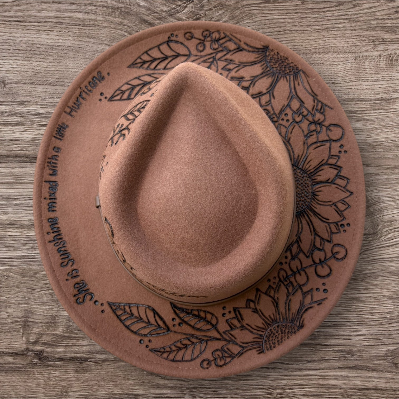 Tan Fedora- 100% wool. Pyrography Sunflowers and ‘she is sunshine mixed with a little hurricane.’ quote.