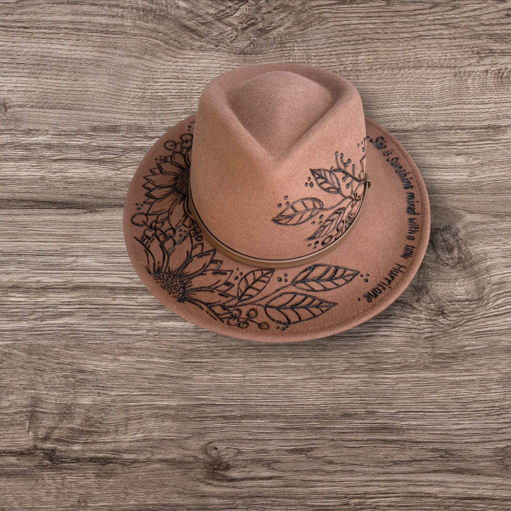 Tan Fedora- 100% wool. Pyrography Sunflowers and ‘she is sunshine mixed with a little hurricane.’ quote.