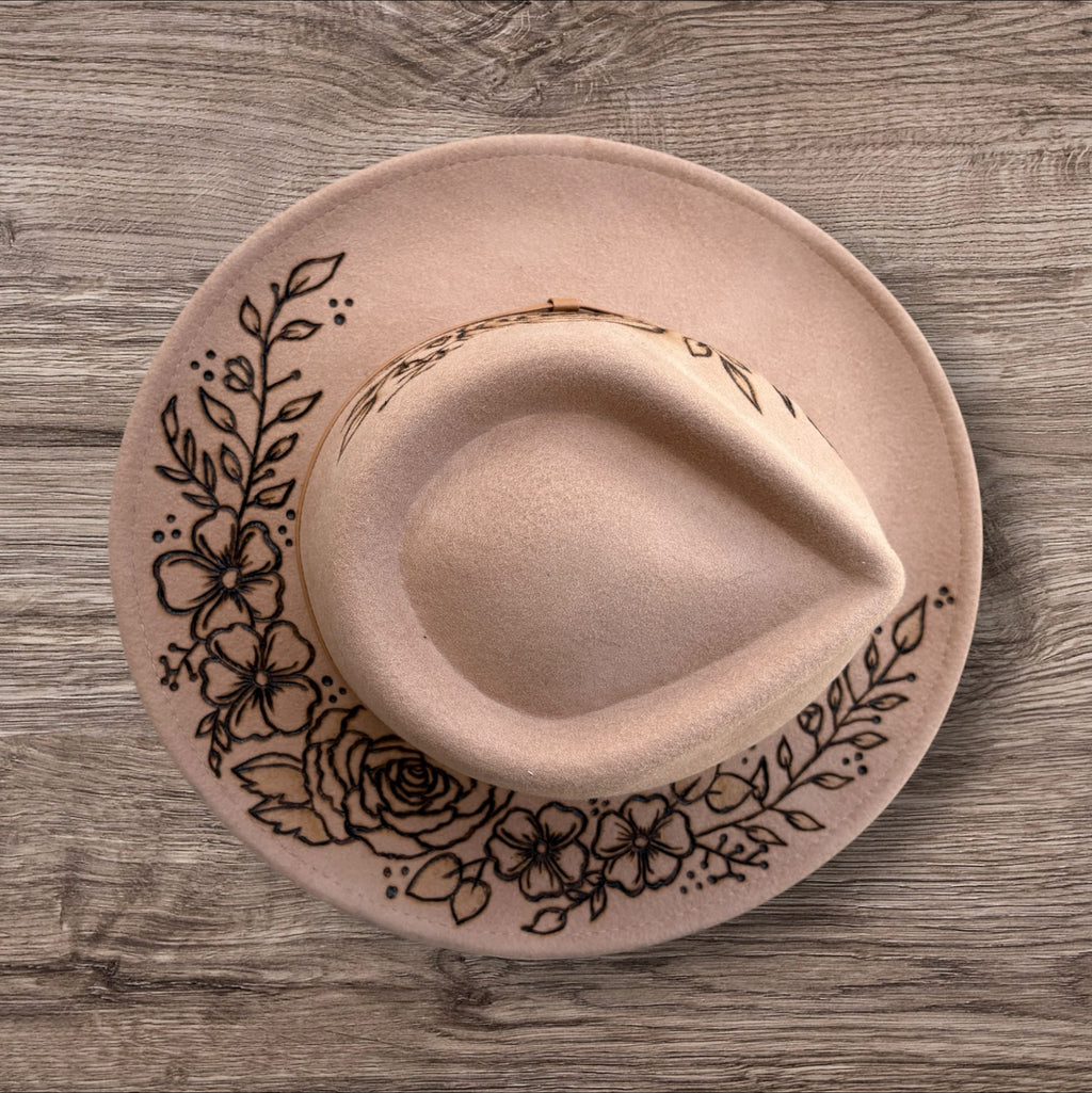 Camel Fedora- 100% wool. Pyrography flowers with ‘nothing is impossible even the word itself says ‘I’m possible!’’ Quote underneath brim.