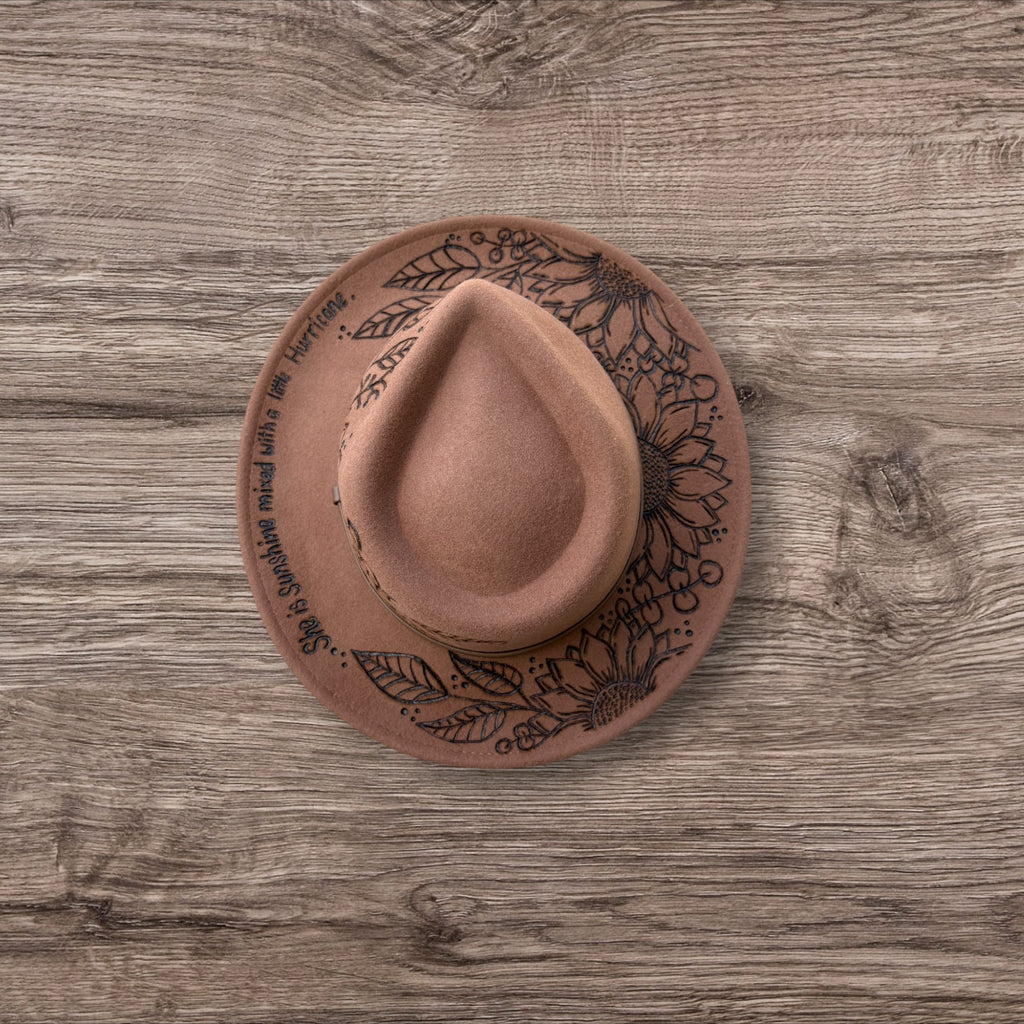 Tan Fedora- 100% wool. Pyrography Sunflowers and ‘she is sunshine mixed with a little hurricane.’ quote.