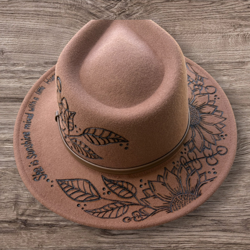 Tan Fedora- 100% wool. Pyrography Sunflowers and ‘she is sunshine mixed with a little hurricane.’ quote.