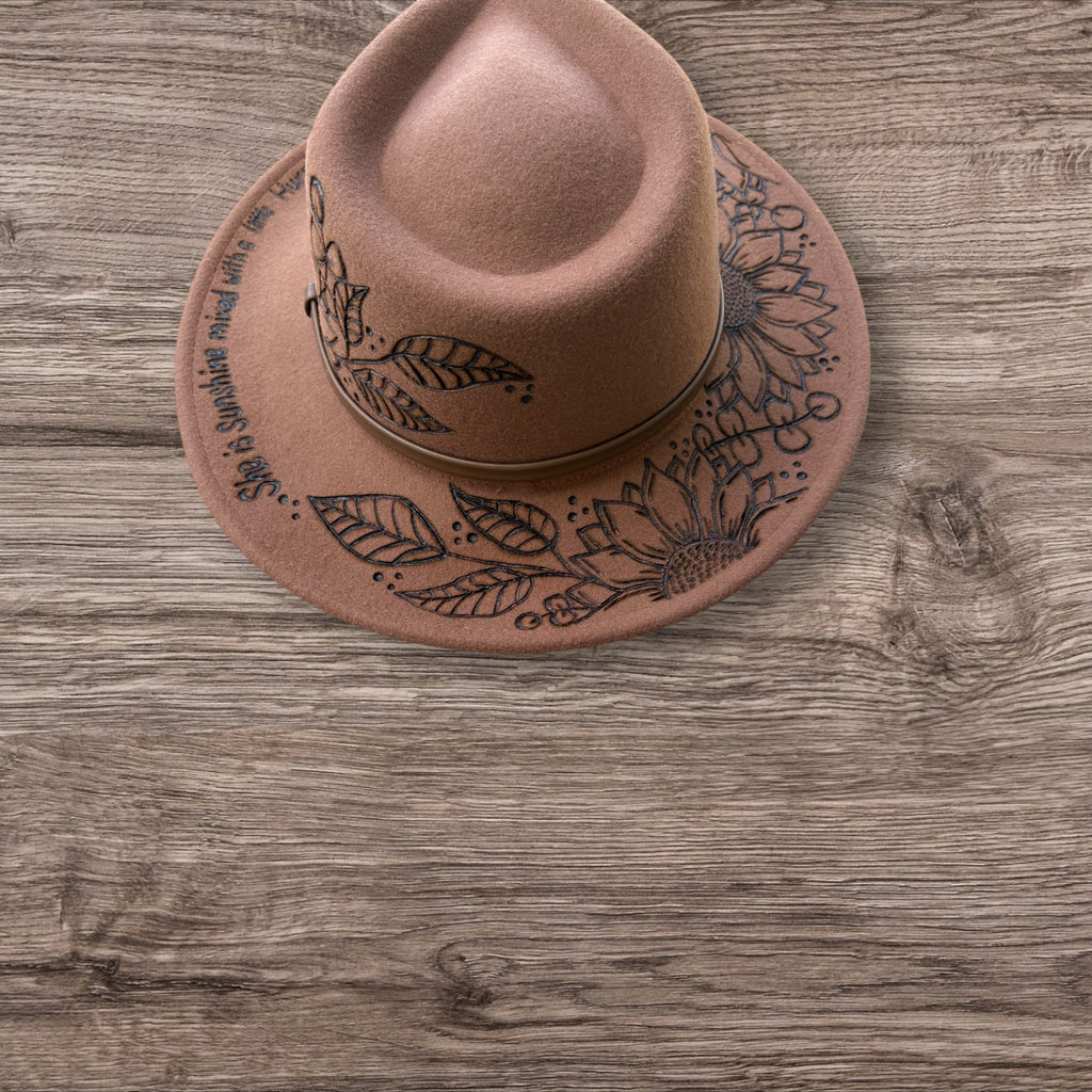 Tan Fedora- 100% wool. Pyrography Sunflowers and ‘she is sunshine mixed with a little hurricane.’ quote.